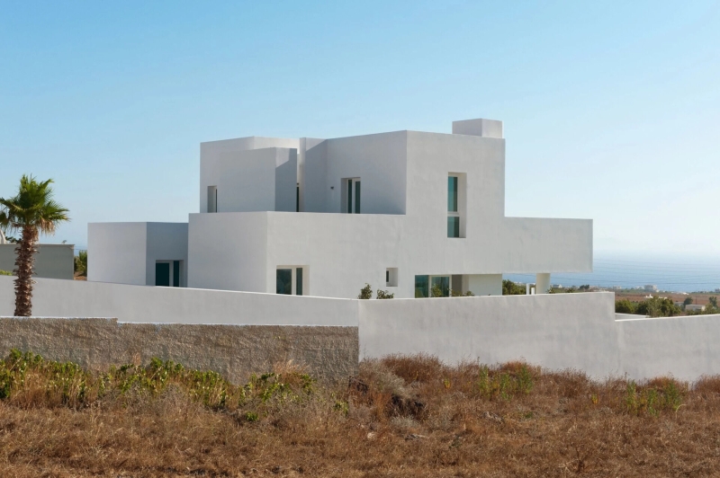 Inside the dazzling white summer home redefining island life in Santorini