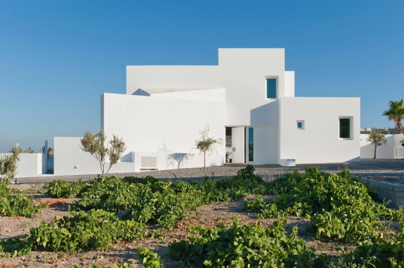 Inside the dazzling white summer home redefining island life in Santorini