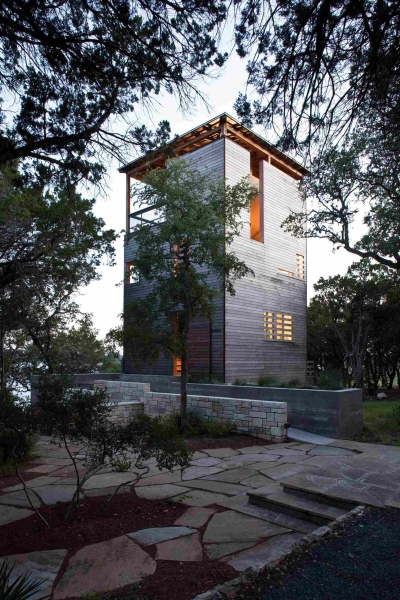 Inside the Vertical Wooden Home Hidden Among the Texas Trees