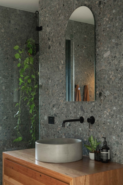 Inside the wraparound porch home glowing at golden hour