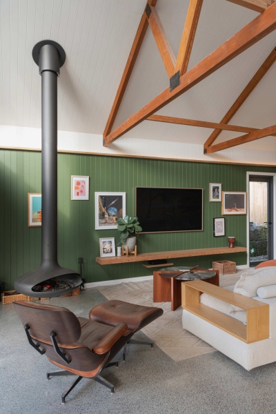 Inside the wraparound porch home glowing at golden hour