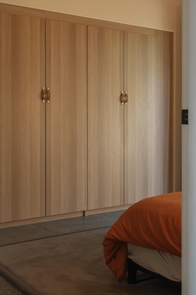 Inside the wraparound porch home glowing at golden hour