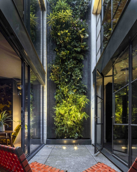 The London House with a Secret Basement, Double-Height Courtyard and Green Wall