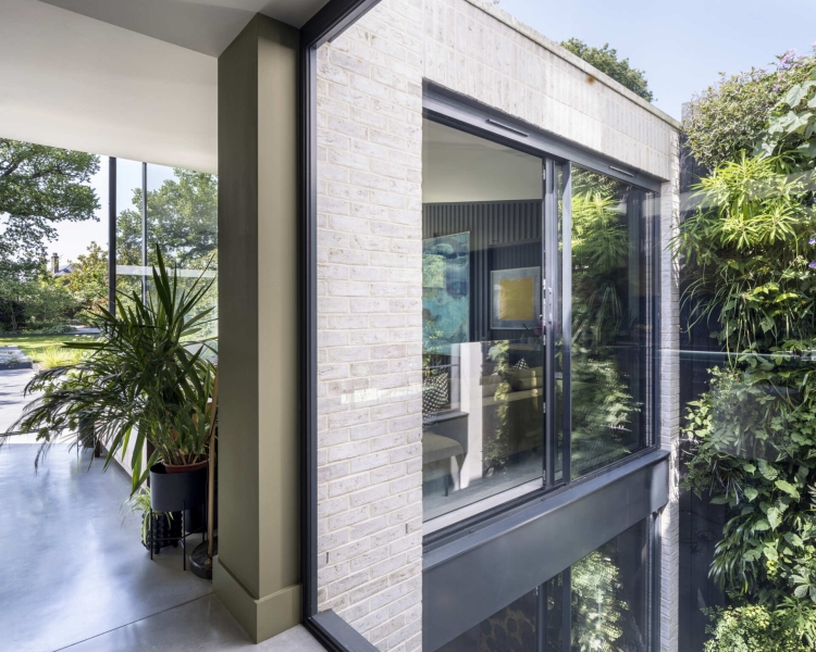 The London House with a Secret Basement, Double-Height Courtyard and Green Wall