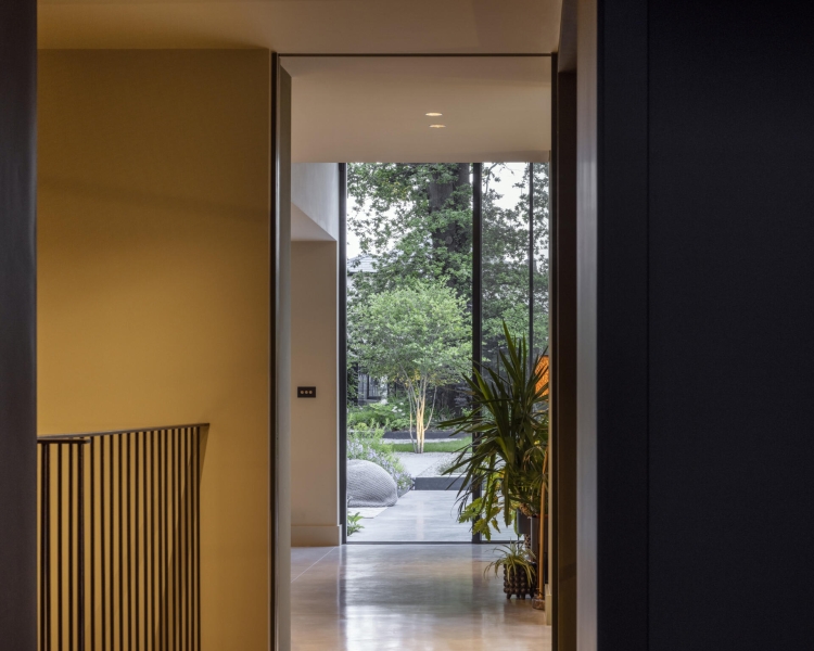 The London House with a Secret Basement, Double-Height Courtyard and Green Wall