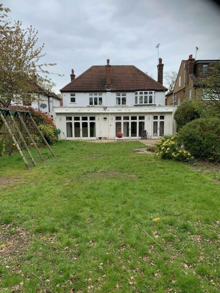 The London House with a Secret Basement, Double-Height Courtyard and Green Wall