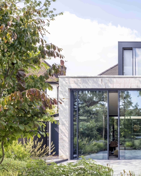 The London House with a Secret Basement, Double-Height Courtyard and Green Wall