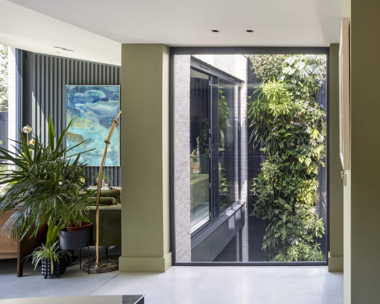 The London House with a Secret Basement, Double-Height Courtyard and Green Wall