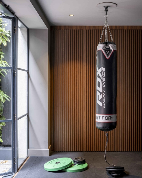 The London House with a Secret Basement, Double-Height Courtyard and Green Wall