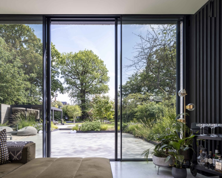 The London House with a Secret Basement, Double-Height Courtyard and Green Wall