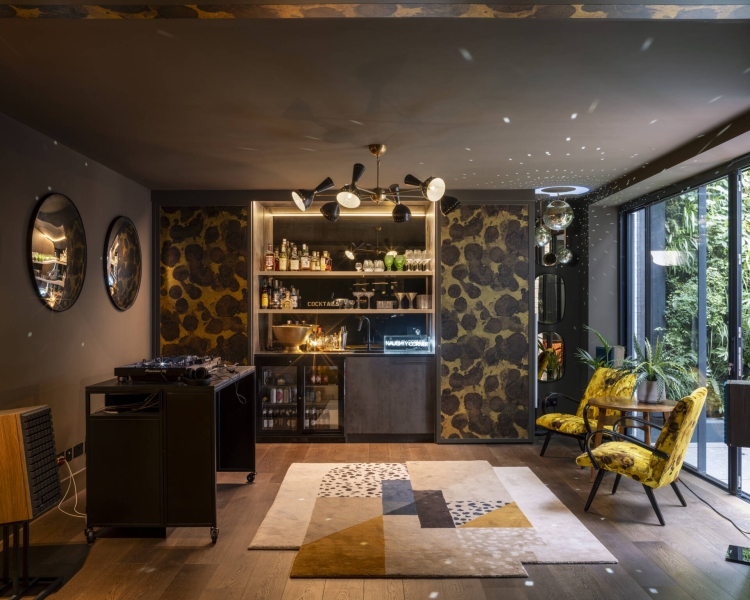 The London House with a Secret Basement, Double-Height Courtyard and Green Wall