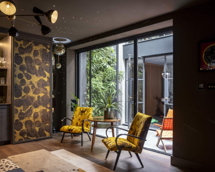 The London House with a Secret Basement, Double-Height Courtyard and Green Wall