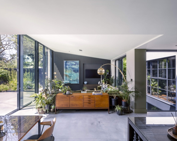 The London House with a Secret Basement, Double-Height Courtyard and Green Wall