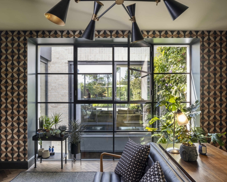 The London House with a Secret Basement, Double-Height Courtyard and Green Wall