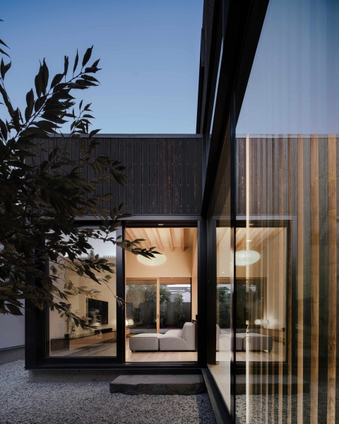 This Courtyard House Wraps Around Quiet Gardens