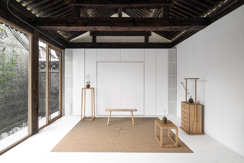 This Home's Courtyard Curves Through The Roof, Floor, and Walls