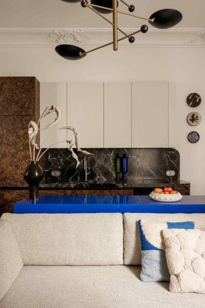 This small apartment feels twice the size, because the bathroom hides in a mirrored box