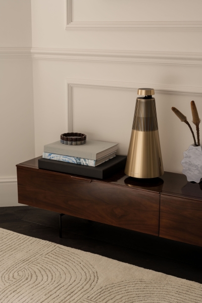 This small apartment feels twice the size, because the bathroom hides in a mirrored box