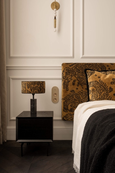 This small apartment feels twice the size, because the bathroom hides in a mirrored box