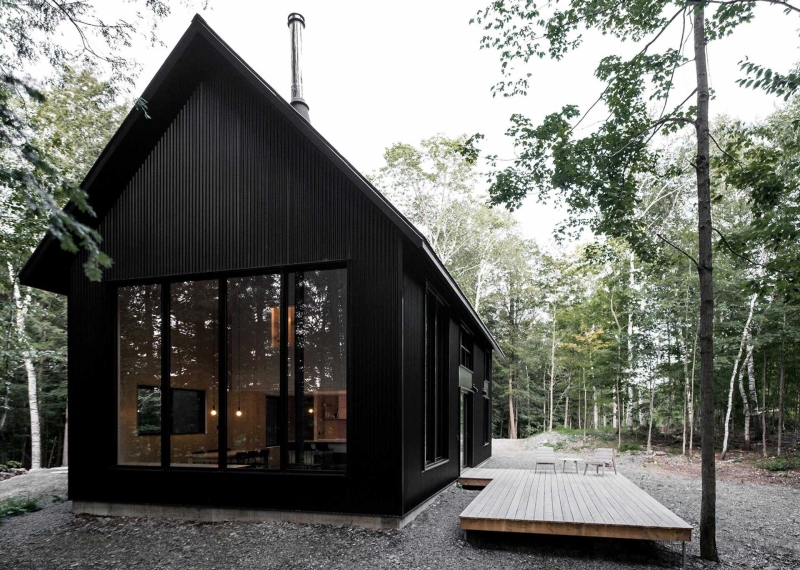 Why This Moody Black Cottage in the Canadian Woods Feels So Peaceful Inside