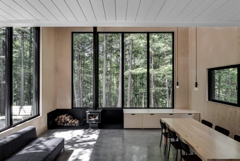 Why This Moody Black Cottage in the Canadian Woods Feels So Peaceful Inside