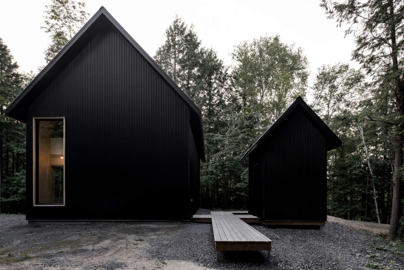 Why This Moody Black Cottage in the Canadian Woods Feels So Peaceful Inside