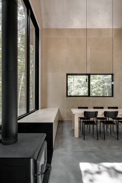 Why This Moody Black Cottage in the Canadian Woods Feels So Peaceful Inside