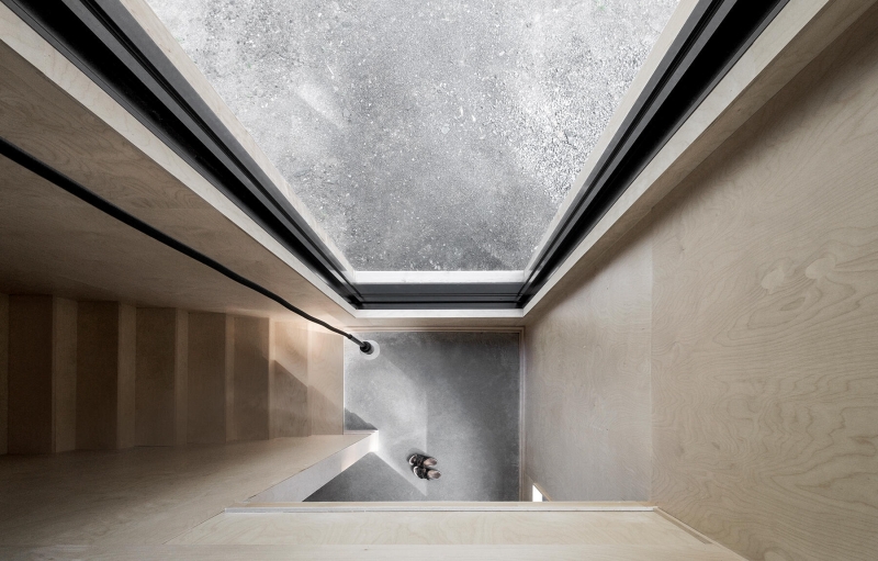 Why This Moody Black Cottage in the Canadian Woods Feels So Peaceful Inside