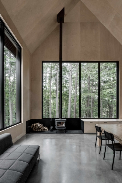 Why This Moody Black Cottage in the Canadian Woods Feels So Peaceful Inside