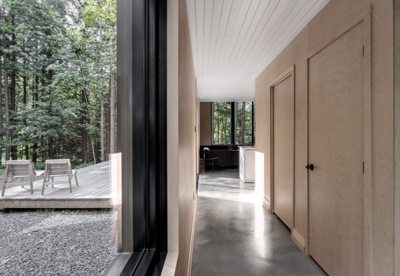 Why This Moody Black Cottage in the Canadian Woods Feels So Peaceful Inside
