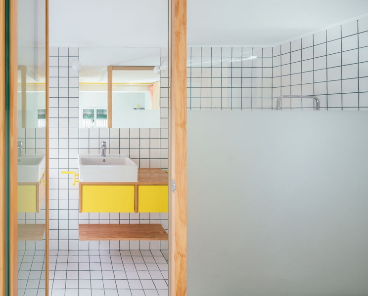 A Pocket Sized Home with a Raised Bedroom and Plenty of Storage