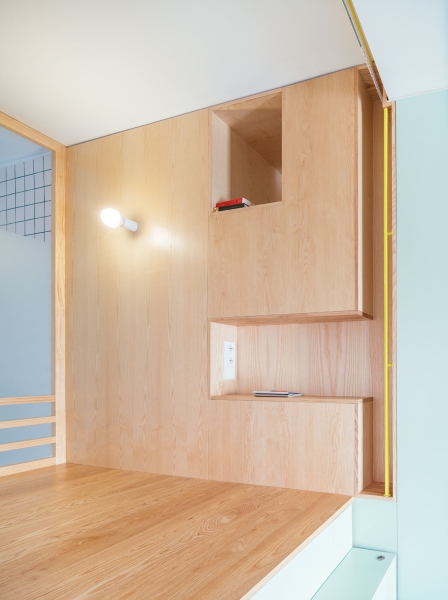 A Pocket Sized Home with a Raised Bedroom and Plenty of Storage