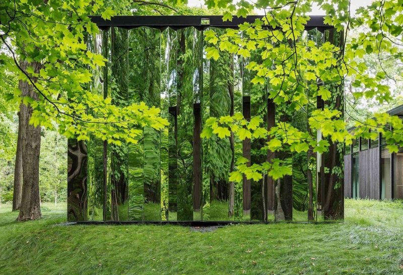 A Quiet Luxury Home in the Woods With a Shed That Almost Disappears