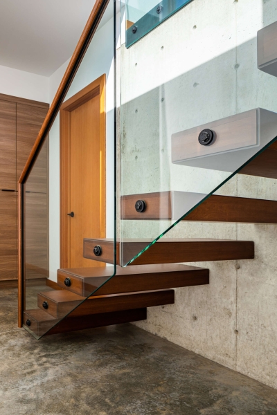 Inside the Lakeside Home That Turns a Steep Slope Into Easy Living