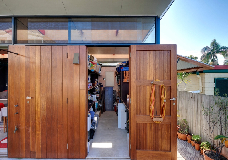 Take a Look at a Small Backyard Studio with a Living Space, Bathroom, and Workspace