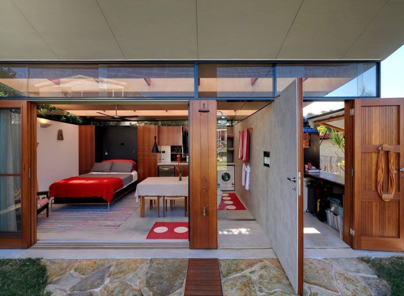 Take a Look at a Small Backyard Studio with a Living Space, Bathroom, and Workspace