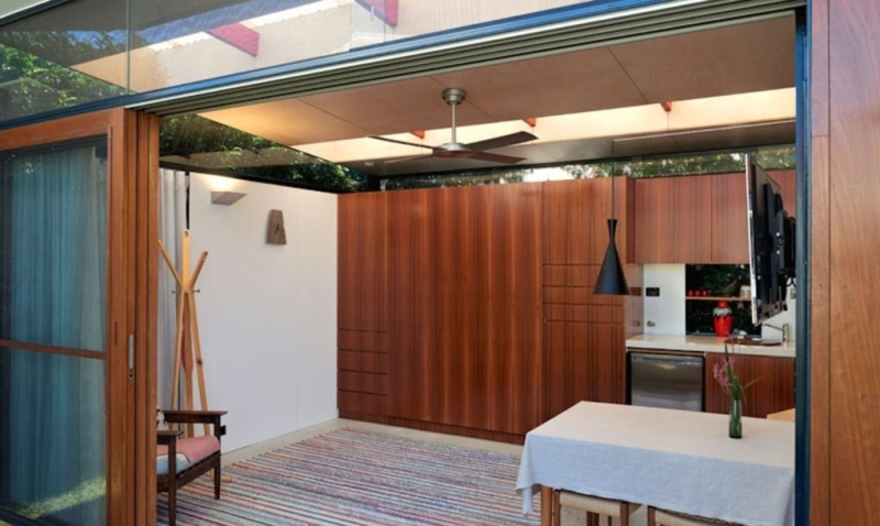 Take a Look at a Small Backyard Studio with a Living Space, Bathroom, and Workspace