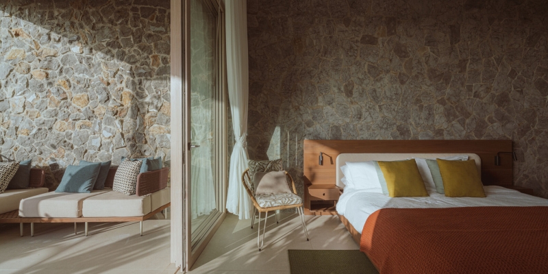 Terrace Living and a Cantilevered Pool in a Hillside Home