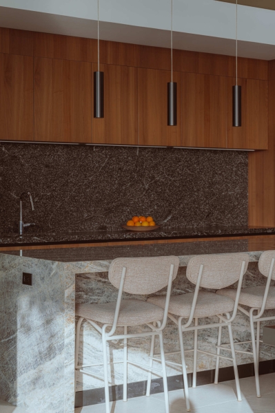 Terrace Living and a Cantilevered Pool in a Hillside Home