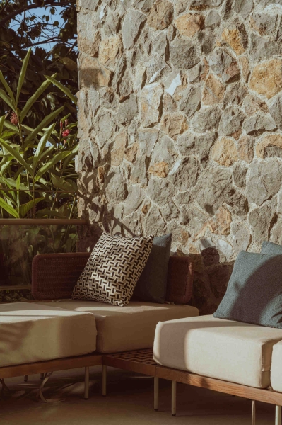 Terrace Living and a Cantilevered Pool in a Hillside Home