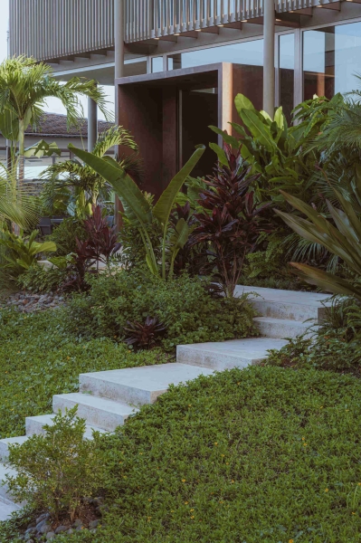 Terrace Living and a Cantilevered Pool in a Hillside Home