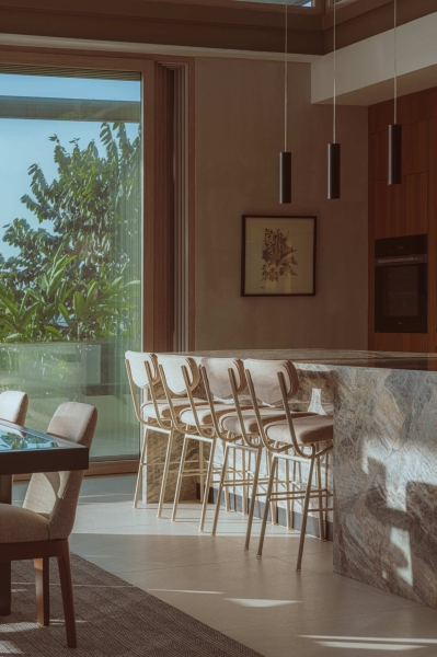 Terrace Living and a Cantilevered Pool in a Hillside Home