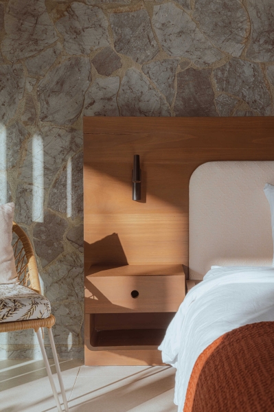 Terrace Living and a Cantilevered Pool in a Hillside Home