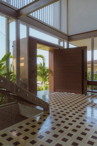 Terrace Living and a Cantilevered Pool in a Hillside Home