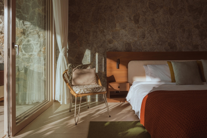 Terrace Living and a Cantilevered Pool in a Hillside Home