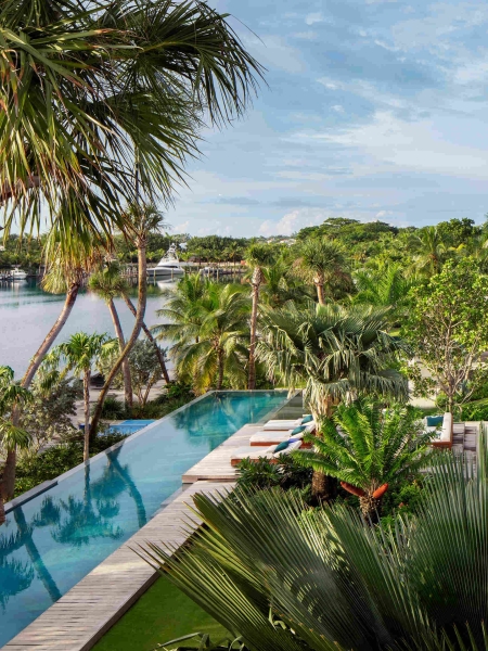 The Tropical Home Crafted Around Light Filled Spaces and Lush Outdoor Rooms