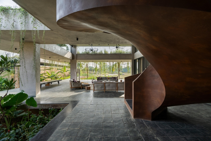 Tour this home that uses Stone Walls and Hanging Greens to Shape Every Space