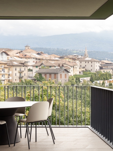 A Bold Black House Rises From a Landscape of Orchards