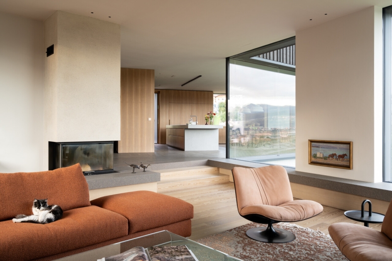 A Bold Black House Rises From a Landscape of Orchards