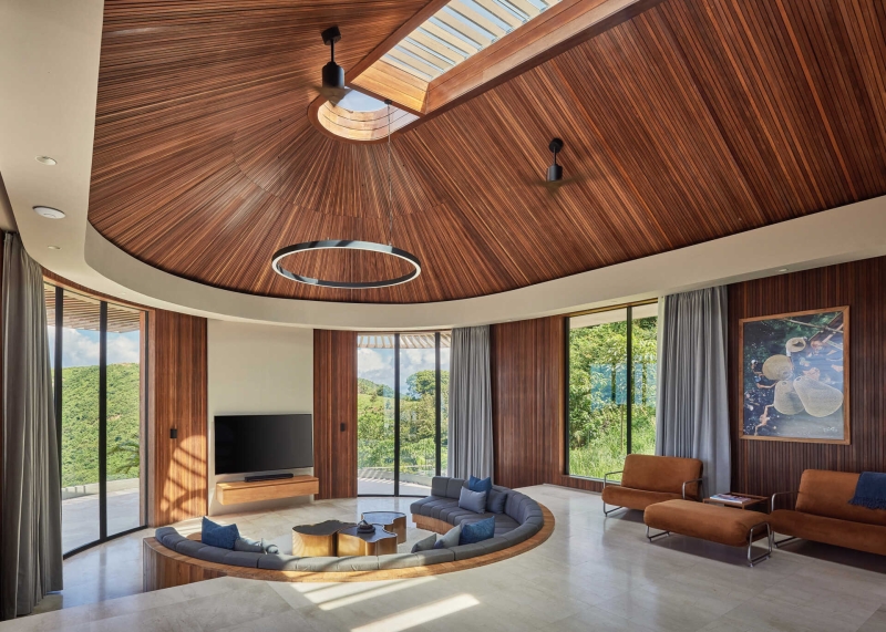 A Sculptural Home Uses Circles to Frame Land, Light, and Views